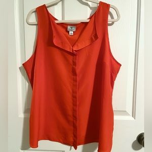 Worthington sleeveless blouse in bright orange.